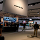 Illustration for article titled Chrysler Sign Almost Decapitates Detroit Auto Show-goer